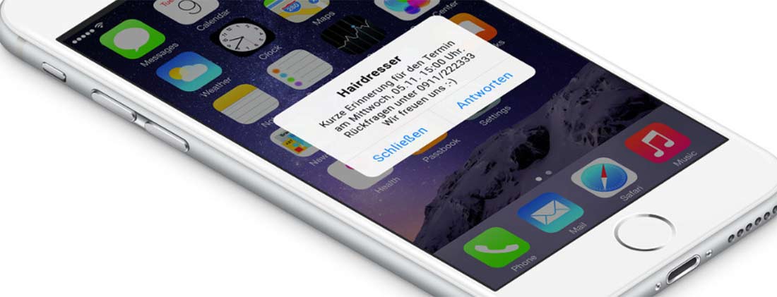 iPhone-Screen mit eingegangener SMS mit Termin-Erinnerung vom Friseur